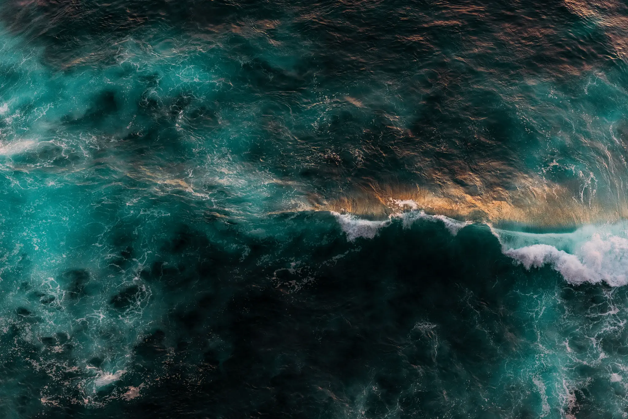 Breaking waves aerial view